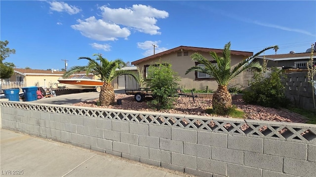 5209 Del Monte Ave, Las Vegas, NV 89146 - view of front of property with concrete driveway and stucco siding