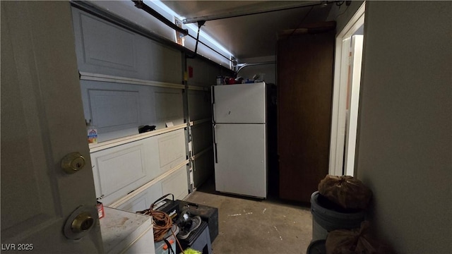 5209 Del Monte Ave, Las Vegas, NV 89146 - garage featuring freestanding refrigerator