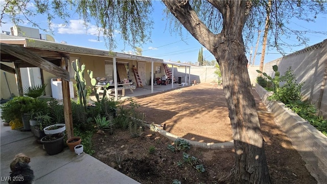 5209 Del Monte Ave, Las Vegas, NV 89146 - view of yard featuring a patio