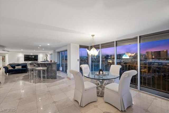 3111 Bel Air Dr Unit 21A & 21C, Las Vegas, NV 89109 - dining space with a chandelier, light tile patterned flooring, and recessed lighting