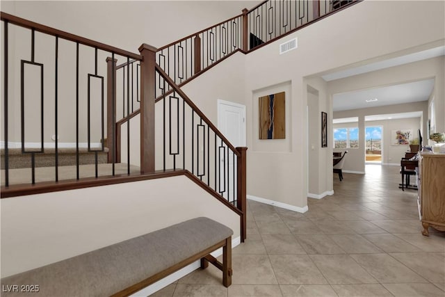 2714 Frabiele St, Henderson, NV 89044 - staircase with baseboards and tile patterned flooring