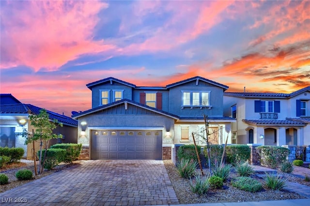 2714 Frabiele St, Henderson, NV 89044 - view of front of property with decorative driveway, a garage, and stucco siding