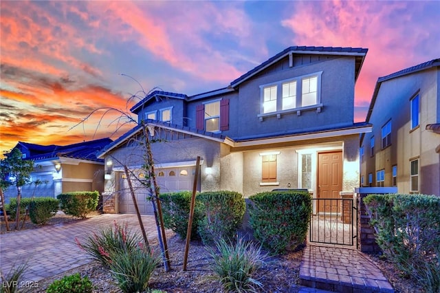 2714 Frabiele St, Henderson, NV 89044 - view of front of home with stucco siding, driveway, an attached garage, and a gate