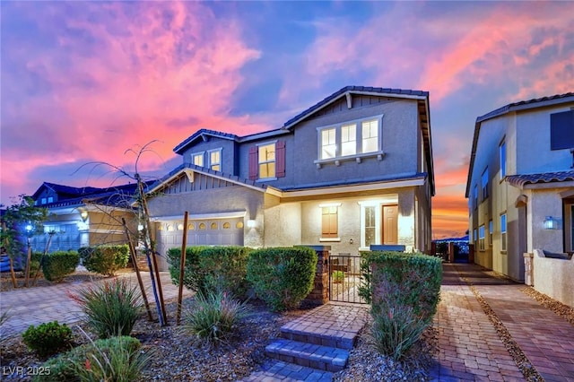 2714 Frabiele St, Henderson, NV 89044 - view of front of house with a fenced front yard, stucco siding, a gate, and a tiled roof