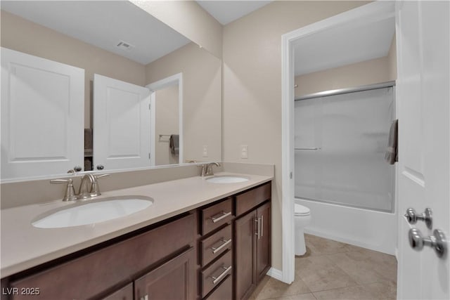 2714 Frabiele St, Henderson, NV 89044 - bathroom with double vanity, bath / shower combo with glass door, and tile patterned flooring