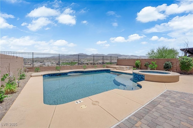2714 Frabiele St, Henderson, NV 89044 - view of pool with a fenced backyard, a mountain view, a patio, and a pool with connected hot tub
