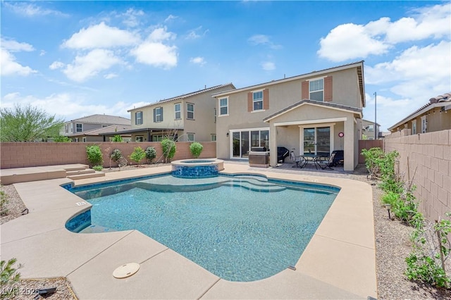 2714 Frabiele St, Henderson, NV 89044 - view of swimming pool with a fenced backyard, a patio, and a pool with connected hot tub