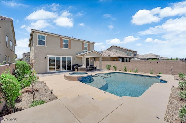 2714 Frabiele St, Henderson, NV 89044 - view of swimming pool featuring a patio area, a fenced backyard, a pool with connected hot tub, and area for grilling