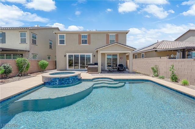 2714 Frabiele St, Henderson, NV 89044 - view of pool featuring a fenced backyard, a pool with connected hot tub, and a patio