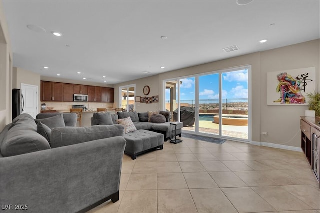 2714 Frabiele St, Henderson, NV 89044 - living area with light tile patterned floors and recessed lighting