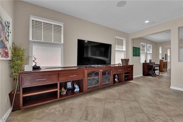 2714 Frabiele St, Henderson, NV 89044 - living room with light tile patterned floors and baseboards