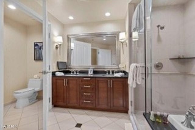 135 E Harmon Ave Unit 407, Las Vegas, NV 89109 - full bath featuring tile patterned floors, a stall shower, double vanity, and recessed lighting