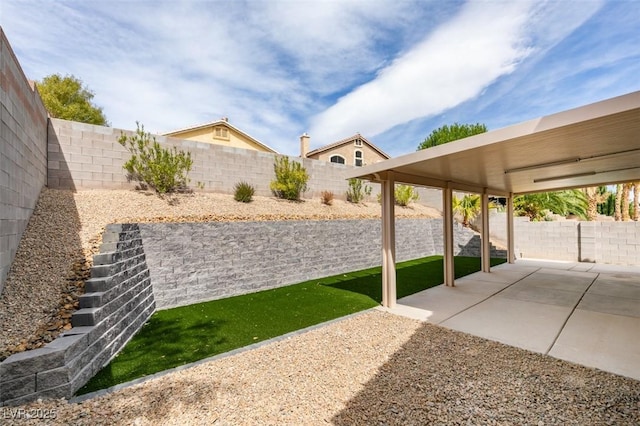 10452 Niagara Falls Ln, Las Vegas, NV 89144 - fenced backyard with a patio