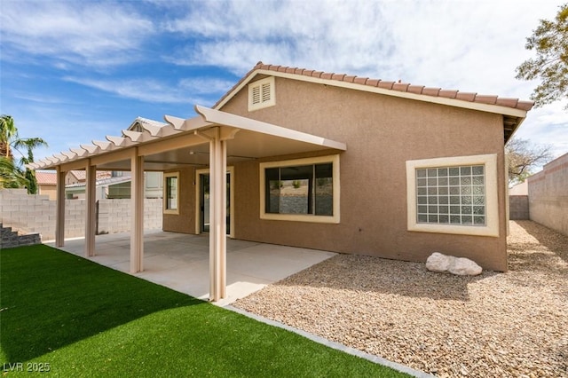 10452 Niagara Falls Ln, Las Vegas, NV 89144 - back of house featuring stucco siding and a patio area
