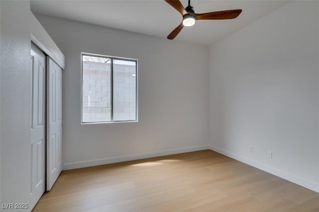 10452 Niagara Falls Ln, Las Vegas, NV 89144 - unfurnished bedroom featuring light wood-style flooring, a closet, and ceiling fan
