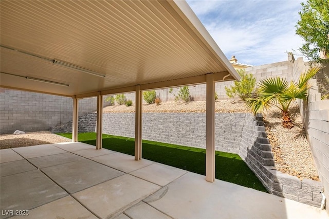 10452 Niagara Falls Ln, Las Vegas, NV 89144 - fenced backyard featuring a patio area