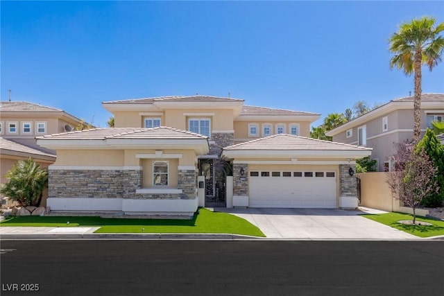 712 Proud Eagle Ln, Las Vegas, NV 89144 - prairie-style home featuring stone siding, an attached garage, driveway, stucco siding, and a tile roof