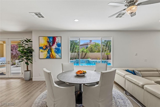 712 Proud Eagle Ln, Las Vegas, NV 89144 - dining room featuring light wood-type flooring, ceiling fan, and recessed lighting