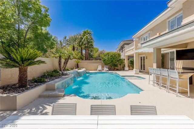 712 Proud Eagle Ln, Las Vegas, NV 89144 - view of pool featuring a patio area and a fenced backyard