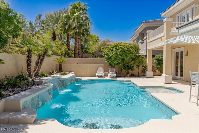 712 Proud Eagle Ln, Las Vegas, NV 89144 - view of swimming pool with french doors, a fenced backyard, and a patio
