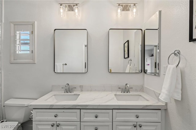 712 Proud Eagle Ln, Las Vegas, NV 89144 - full bath with double vanity and toilet