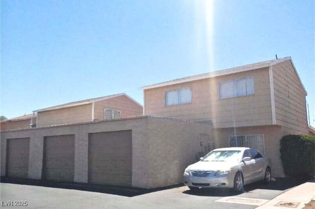 5155 Gray Ln, Las Vegas, NV 89119 - view of property with an attached garage