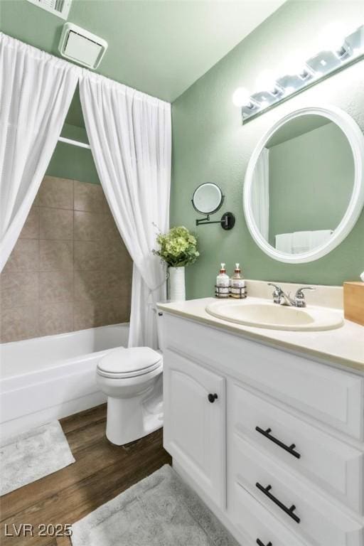 6536 Pleasant Plains Way, Las Vegas, NV 89108 - bathroom featuring vanity, shower / bath combo, and wood finished floors