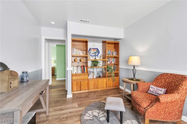 6536 Pleasant Plains Way, Las Vegas, NV 89108 - sitting room featuring wood finished floors and baseboards