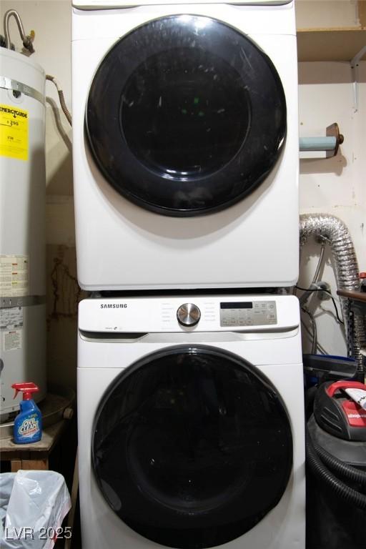 6536 Pleasant Plains Way, Las Vegas, NV 89108 - washroom with stacked washer / dryer and gas water heater