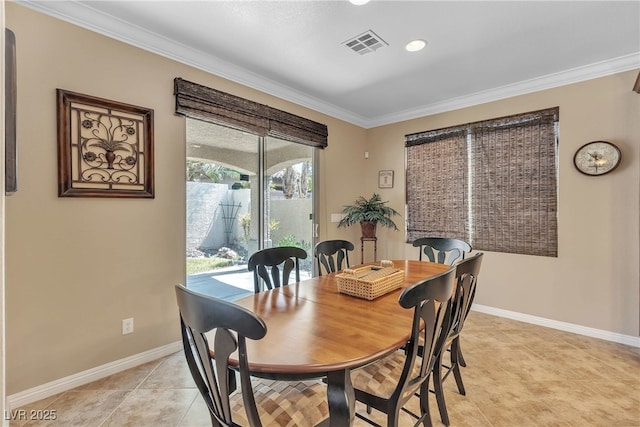 4408 Oasis Plains Ave, North Las Vegas, NV 89085 - dining space with crown molding and light tile patterned floors