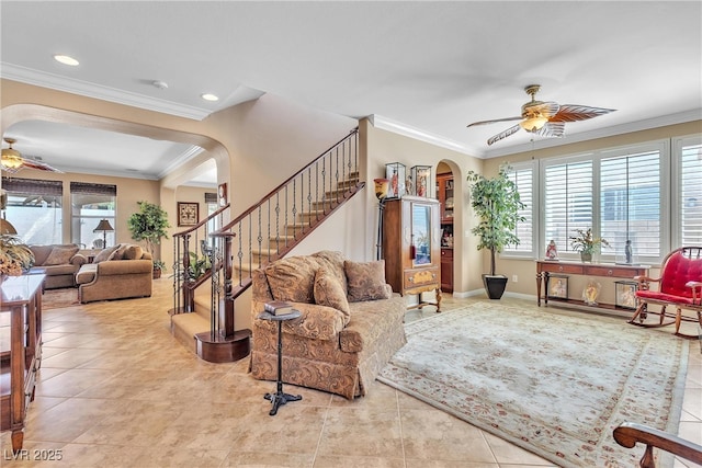 4408 Oasis Plains Ave, North Las Vegas, NV 89085 - living room with ceiling fan, arched walkways, plenty of natural light, ornamental molding, and recessed lighting