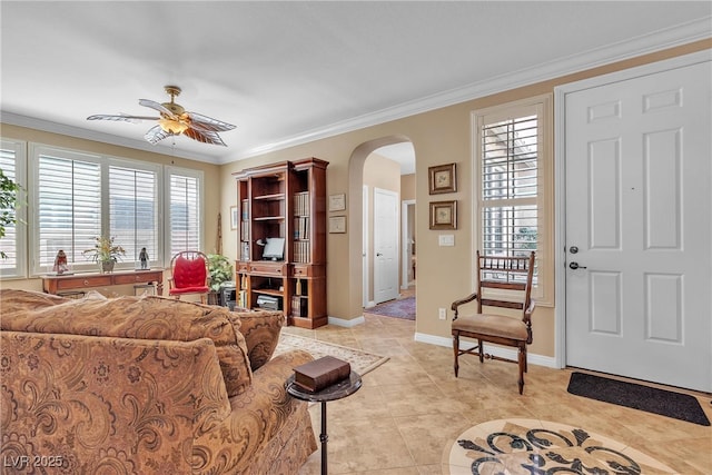 4408 Oasis Plains Ave, North Las Vegas, NV 89085 - living room featuring arched walkways, ceiling fan, ornamental molding, plenty of natural light, and light tile patterned floors
