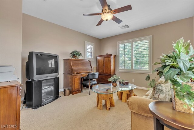 4408 Oasis Plains Ave, North Las Vegas, NV 89085 - sitting room featuring light carpet and ceiling fan