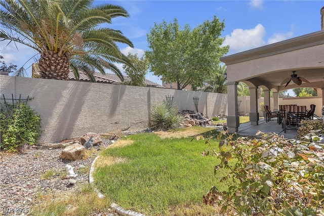 4408 Oasis Plains Ave, North Las Vegas, NV 89085 - fenced backyard featuring a ceiling fan and a patio area