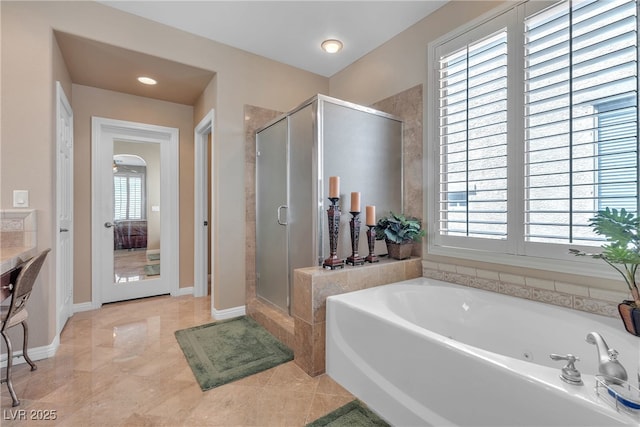 4408 Oasis Plains Ave, North Las Vegas, NV 89085 - full bath featuring a shower stall, a jetted tub, and vanity