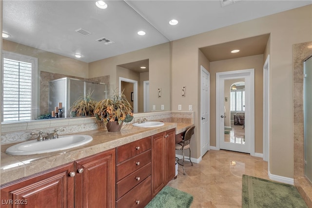 4408 Oasis Plains Ave, North Las Vegas, NV 89085 - full bathroom featuring a stall shower, double vanity, and recessed lighting