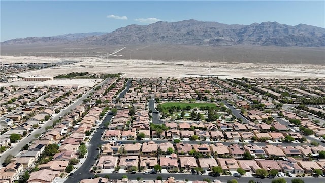 4408 Oasis Plains Ave, North Las Vegas, NV 89085 - aerial view of property's location featuring a mountainous background and nearby suburban area