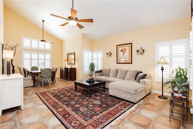 8875 Tidal Bay Dr, Las Vegas, NV 89117 - living area featuring ceiling fan, healthy amount of natural light, high vaulted ceiling, and light tile patterned flooring