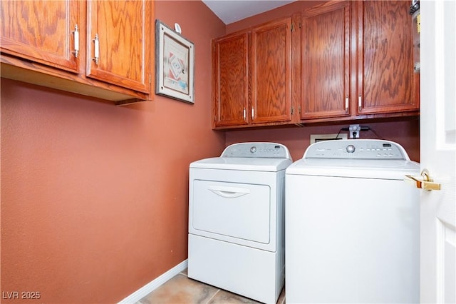 8875 Tidal Bay Dr, Las Vegas, NV 89117 - laundry area featuring washer and dryer and cabinet space