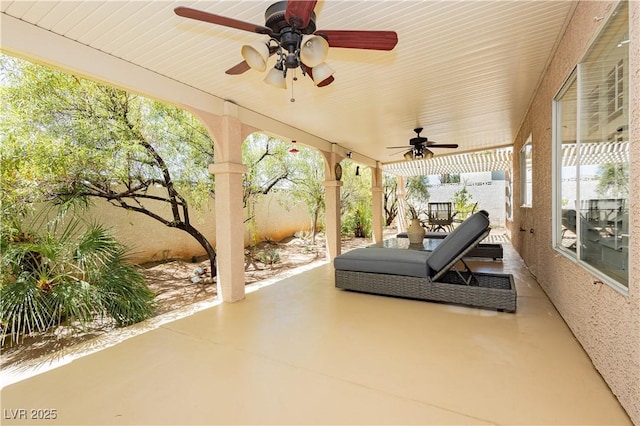 8875 Tidal Bay Dr, Las Vegas, NV 89117 - fenced backyard with a ceiling fan and a patio area