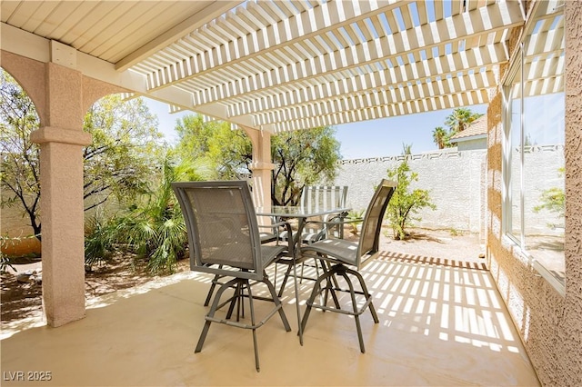 8875 Tidal Bay Dr, Las Vegas, NV 89117 - fenced backyard with outdoor dining area, a patio, and a pergola