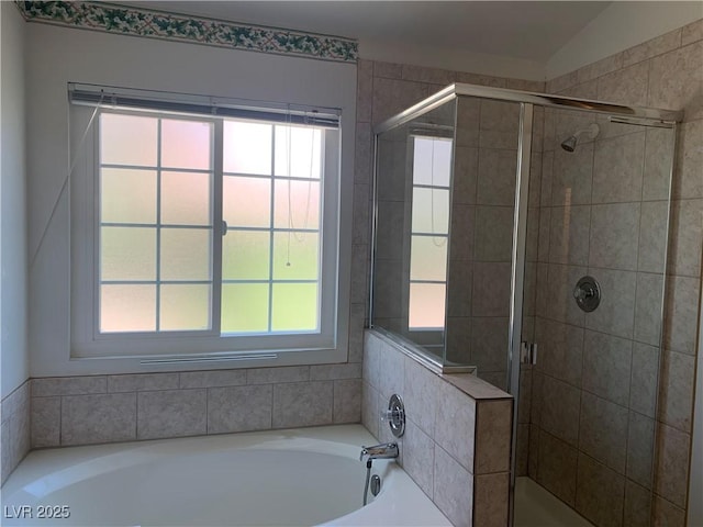 6704 Lost River Ct, Las Vegas, NV 89108 - full bath featuring a bath, a stall shower, and healthy amount of natural light