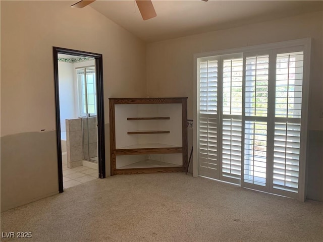 6704 Lost River Ct, Las Vegas, NV 89108 - unfurnished room with ceiling fan, lofted ceiling, and carpet flooring