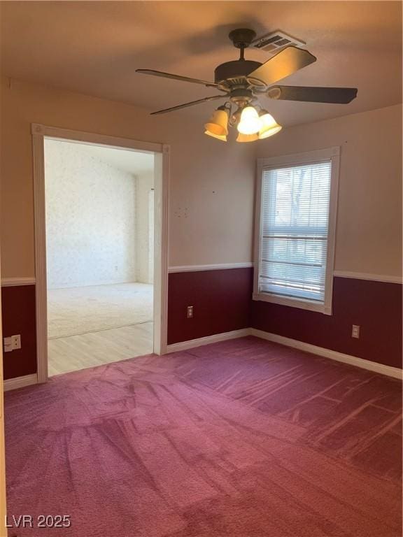 6704 Lost River Ct, Las Vegas, NV 89108 - carpeted empty room featuring ceiling fan