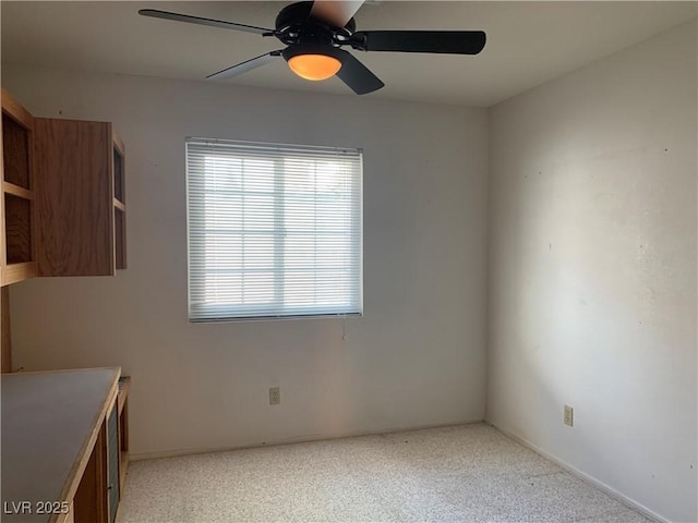 6704 Lost River Ct, Las Vegas, NV 89108 - unfurnished dining area featuring ceiling fan, plenty of natural light, and light colored carpet