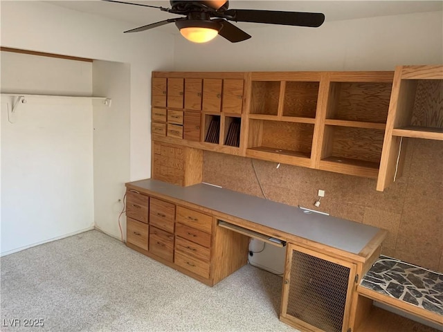 6704 Lost River Ct, Las Vegas, NV 89108 - unfurnished office featuring ceiling fan, built in study area, and light carpet