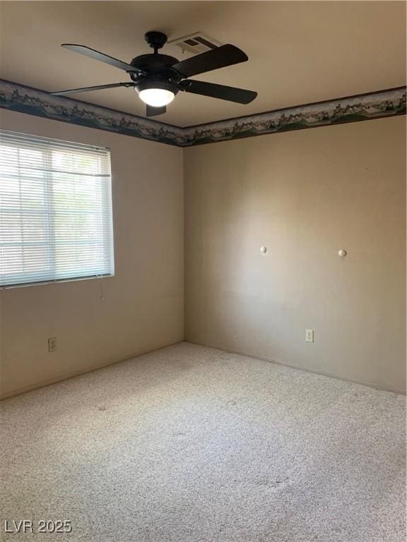 6704 Lost River Ct, Las Vegas, NV 89108 - carpeted empty room featuring a ceiling fan