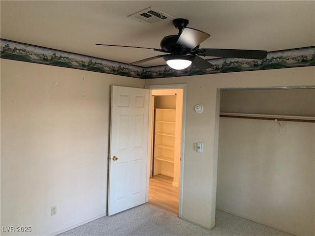 6704 Lost River Ct, Las Vegas, NV 89108 - unfurnished bedroom with carpet flooring, a closet, and a ceiling fan