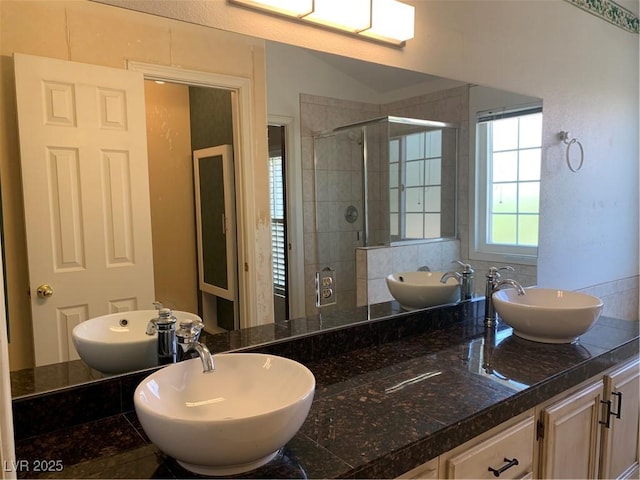 6704 Lost River Ct, Las Vegas, NV 89108 - full bath with a shower stall and double vanity
