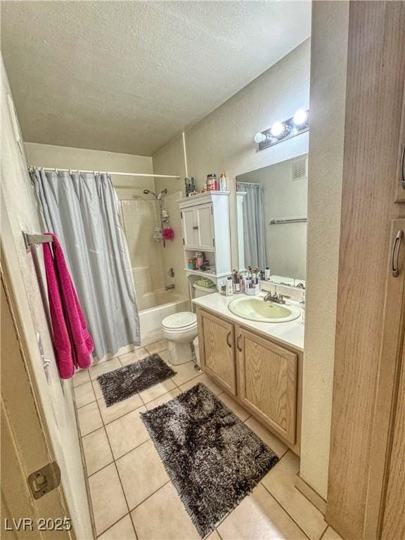 3101 Casey Dr Unit 204, Las Vegas, NV 89120 - full bathroom with tile patterned floors, shower / tub combo, vanity, and a textured ceiling